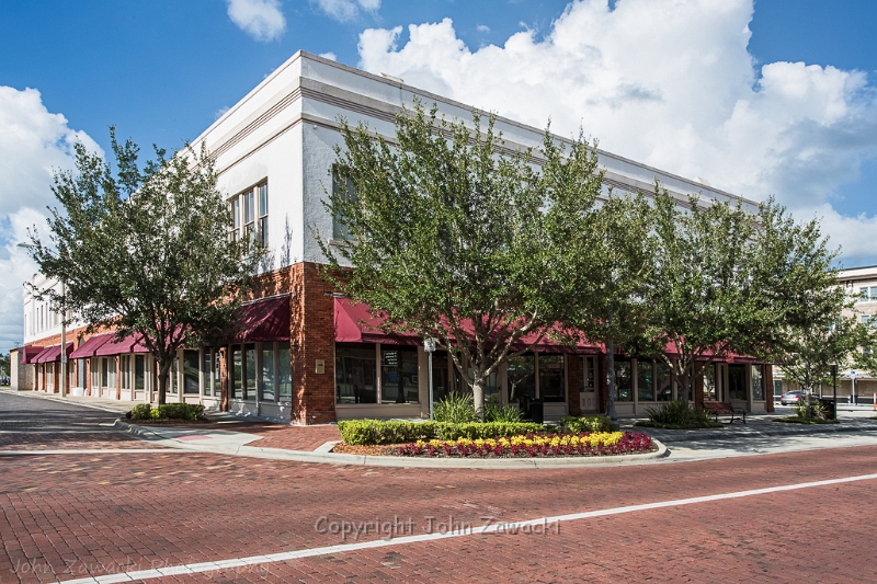 Pico Blick_6831.jpg - Pico Block - 1887 114 West First Street The PICO (Plant investment Co.) Block was built in 1887 by Henry B. Plant to househis company's Sanford offices. It is part of a complex of buildings constructed whenthis area was the center of Sanford's railroads. The remains of a carriageway may beseen on the Oak Avenue side of the building. The brick facade of this L-shapedstructure was covered with stucco in the 1920's when it became the WelakaApartments. In the 1980's the stucco was removed from the first floor.